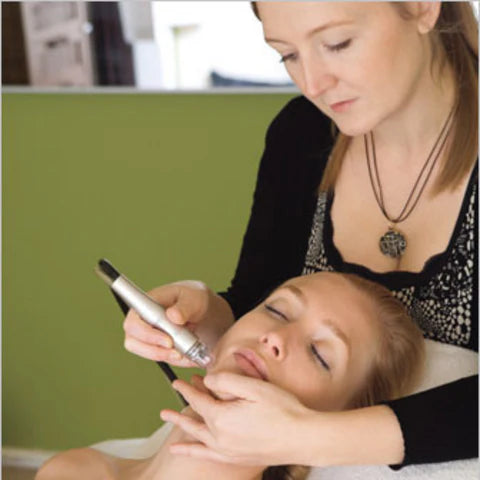 Gunilla Eisenberg performing her Better than Botox Facial featured in Allure Magazine. Up close of esthtetician giving an anti-aging facial in san francisco