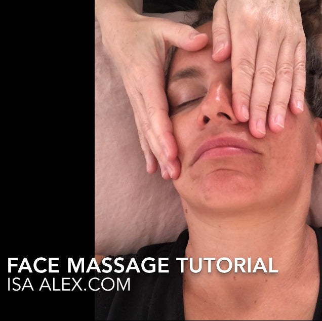 Close-up of a woman's face with two hands covering up the eyes. Snapshot of a face massage video tutorial.